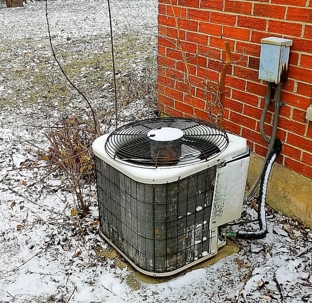 AC unit outdoors in snow